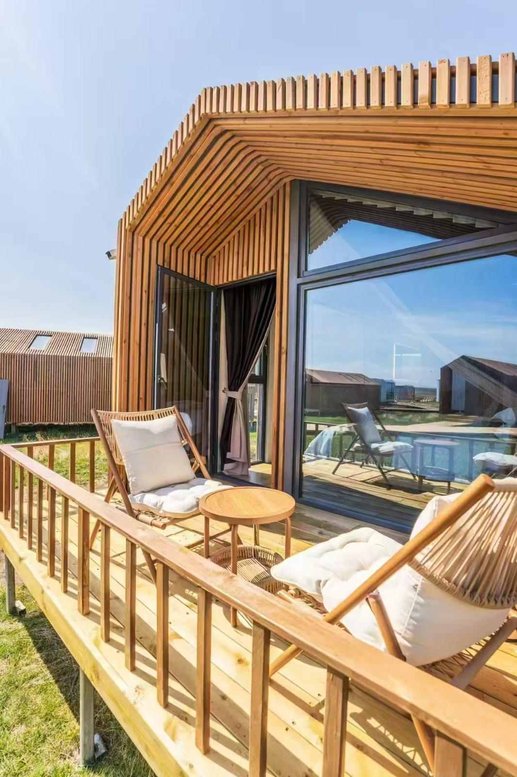Private terrace and outdoor seating at a delivered Xingkong Hotel guest unit