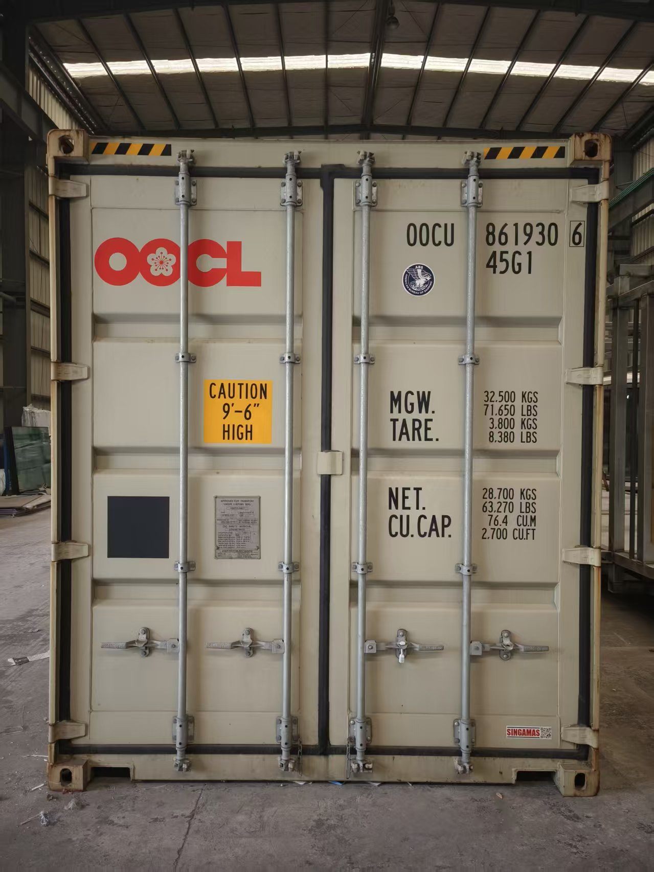 Shipping container door and identification markings during preparation