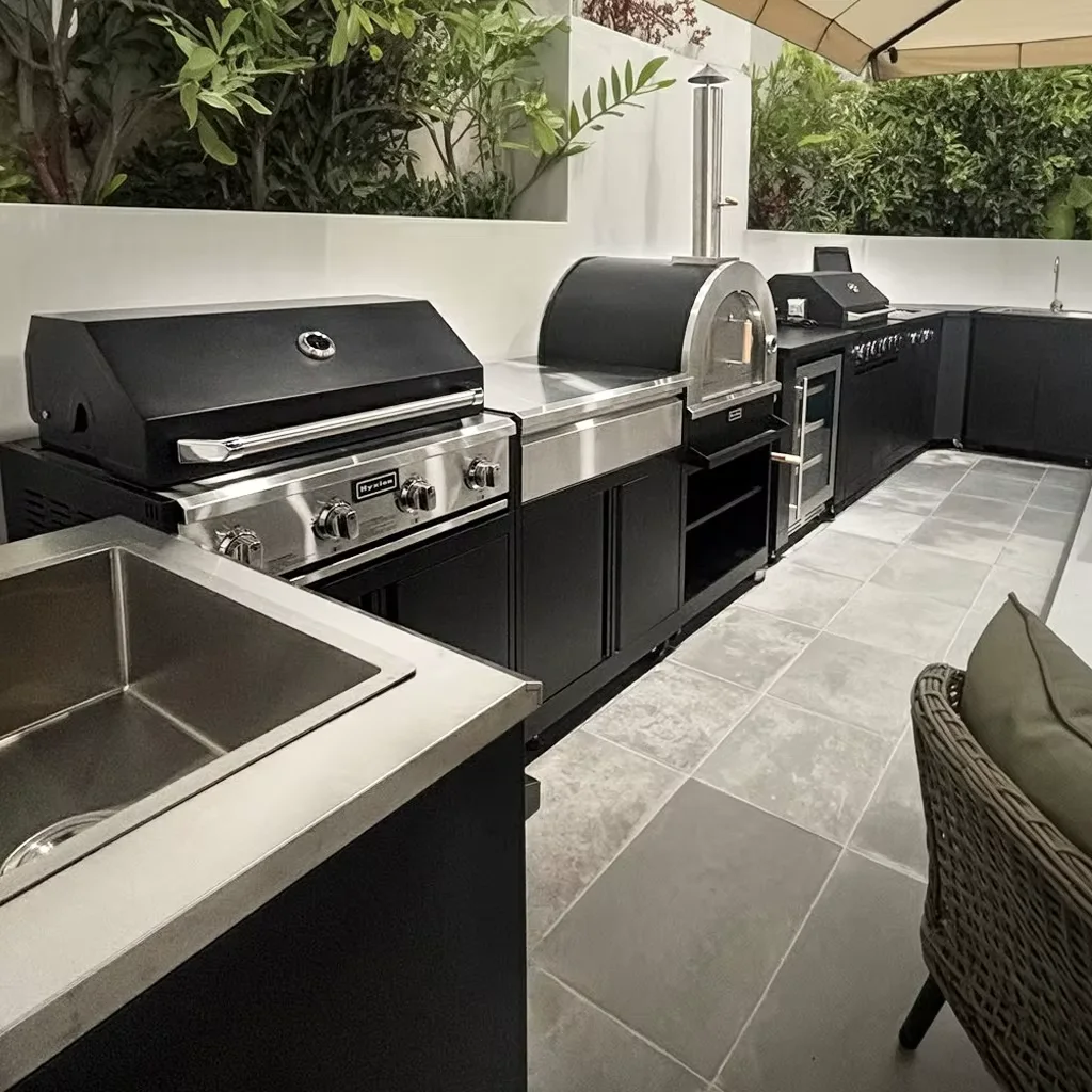 U-shaped open modular outdoor kitchen installed around a terrace work area
